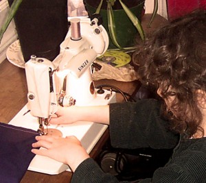 Teaching a child to quilt