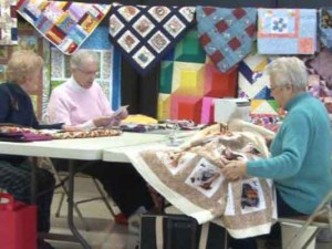ladies quilting for charity